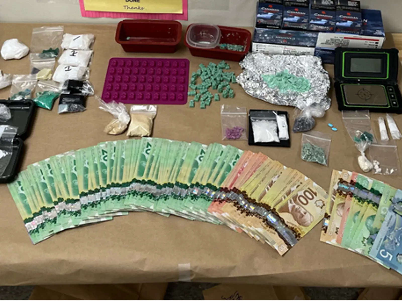 Man and woman charged as police seize over 3700 doses of street drugs ...